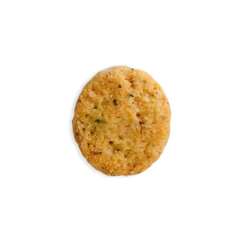 zoom de um biscoito amanteigado temperador com ervas finas, no formato redondo