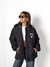 Campera IMPORTADA con aplique de NENA con piel por dentro en internet