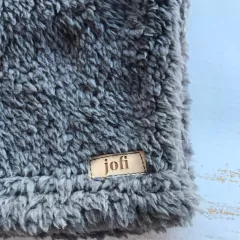 CHALECO CORDERITO BIFAZ- GRIS TOPO en internet