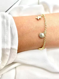Pulseira com pingente de conchas e estrela do mar folheado em ouro 18k - comprar online