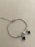 Pulseira com pingentes trevo preto aço inox