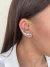Brinco earcuff setas com zircônias banhado a prata