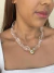 Colar transparente oval detalhe banhado a ouro18k