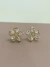 Brinco de flor com zircônias banhado a ouro18k - comprar online