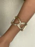 Bracelete largo X com listras banhado a ouro18k