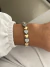 Pulseira corações prime dois banhos