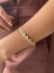 Bracelete trevos cravejados e vazados banhado a ouro18k - comprar online