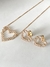 Conjunto coração com zircônias cristal banhado a ouro18k