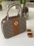 Bolsa prata caramelo com detalhes