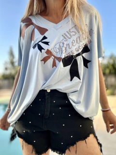 MCA99 Remeron de modal celeste con apliques de moños - comprar online