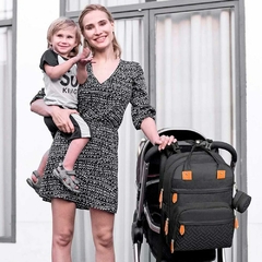 Mochila Maternal Ionify Ur Snow Negra Cambiador Porta Mamadera y Chupete en internet