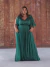 Vestido longo plus size verde esmeralda detalhe de laço na manga com brilho na internet