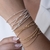 Pulseira Corda de Violão Bolinhas Dourado na internet