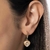 527470 Brinco Rommanel folheado a ouro meia argola e chapéu Woody