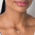 532574 Gargantilha Rommanel folheada a ouro fio de nylon com n. sra. aparecida