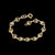 551138 Pulseira Rommanel folheada a ouro infantil formada por rosas