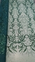 Tul bordado con piedras verde