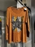 Remera manga larga con estampa en internet