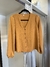 Blusa crepe escote V botones y puño