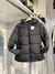 Puffer con capucha