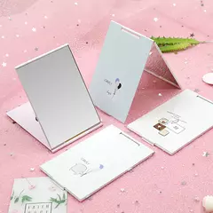 Espejo libro plegable y liviano ideal para viajes