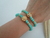 Kit de Pulseiras Espírito Santo/Fé cristal verde água na internet
