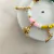 Pulseira 7 Linhas Orixás Cristal Dourada na internet