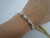 Pulseira 3 pontos strass fecho ímã prata - loja online