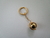 Chaveiro Globo Terrestre Dourado