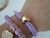 Conjunto de Pulseiras Coração Lilás na internet