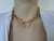 Colar choker fecho mosquetão coração ouro