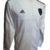 Campera Adidas Adipure 11 Pro de fútbol en color blanco, con detalles en negro y logo de la marca.