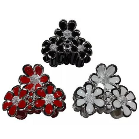 Broches para pelo de mujer en forma de flores, disponibles en colores rojo, negro y blanco, decorados con strass.