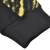 Pantalón jogger de hombre de Puma con detalles en negro y amarillo, ideal para un look deportivo.
