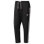Pantalón negro Adidas Originals con franjas blancas en los laterales y logo en la parte frontal.