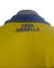 Camiseta de fútbol amarilla de Adidas Boca Juniors, vista del cuello con la inscripción "CASA AMARILLA".