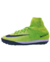 Bota de fútbol Nike Mercurial Proximo DF TF en color verde brillante, diseñada para cancha sintética.