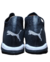 Botines de fútbol PUMA FUTURE MATCH TT ADP para hombre, color negro, con logo de PUMA en la parte trasera.