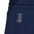 Pantalón jogger adidas de color azul marino con escudo del Real Madrid y logo de adidas.