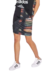 Pollera negra ajustada de adidas Originals con diseño colorido, modelo de Rita Ora, combinada con zapatillas blancas.