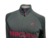 Campera Nike Mercurial de fútbol profesional para hombre, con diseño en gris y detalles en color fucsia.