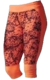 Calza capri para mujer de Adidas en colores naranja y negro, ideal para entrenamiento.