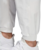 Pantalón blanco de hombre de adidas EQT, con puños en los tobillos y detalles deportivos.