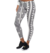 Calza adidas de mujer con diseño en blanco y negro, ideal para actividades deportivas.