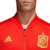 Campera adidas Zne de la selección de fútbol de España, color rojo con detalles en amarillo.