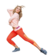Mujer usando calzas adidas Climalite de color naranja, en pose activa, con un fondo desenfocado.