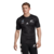 Camiseta de rugby negra de los All Blacks, modelo Mundial Japón 2019, usada por un hombre.