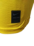 Etiqueta de la remera Nike Pro de color amarillo, destacando su diseño y tecnología de compresión.