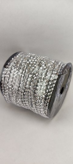 Perla inyectada facetada 4 mm x 50 yardas.