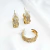 Brinco Argola Semiaberta Folha Entrelaçada Cravejada em Zircônias Folheado a Ouro 18K e Ródio - comprar online